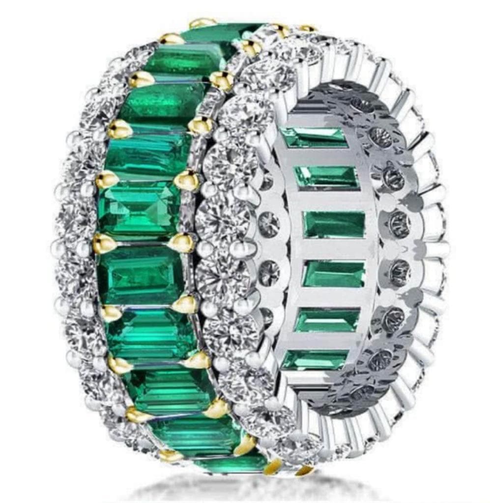 Emerald and diamond eternity band — fine jewelry auction highlight for Dion Abadi