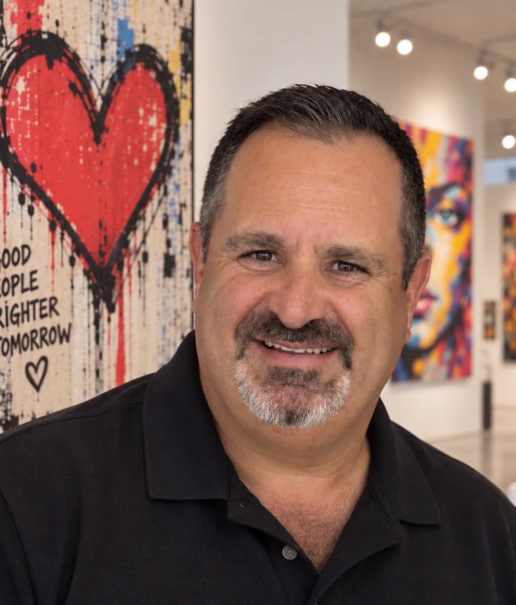 Dion Abadi professional portrait — art and jewelry auctioneer